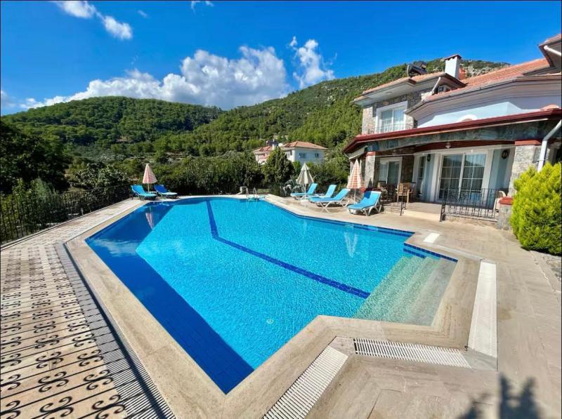 Spectacular Villa with Natural Stone Walls in Uzumlu Fethiye