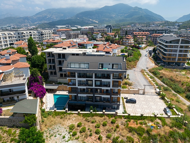 City and Sea View 1+1 Apartment for Sale in Oba Alanya (1)