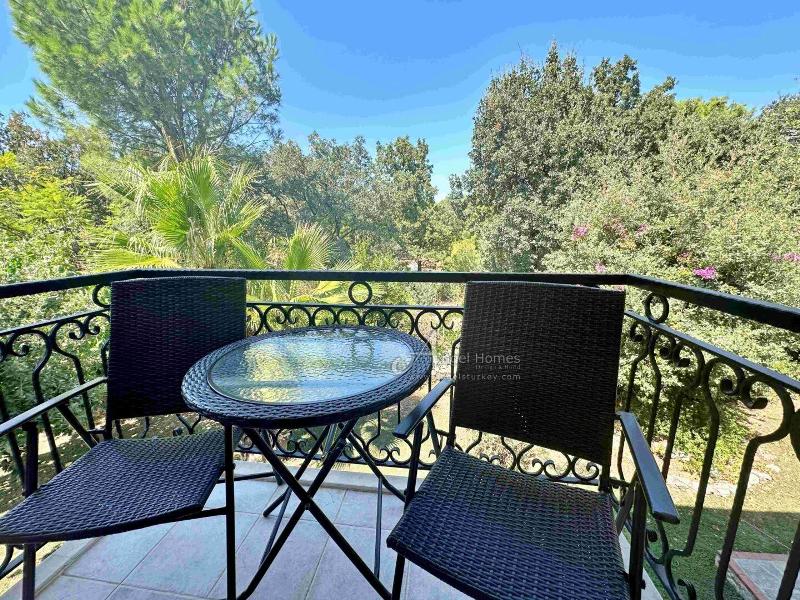 Bargain 2 Bedroom Furnished Property in Hisaronu Oludeniz Fethiye. Located in a gated complex with will landscaped green gardens and Large Shared Pool