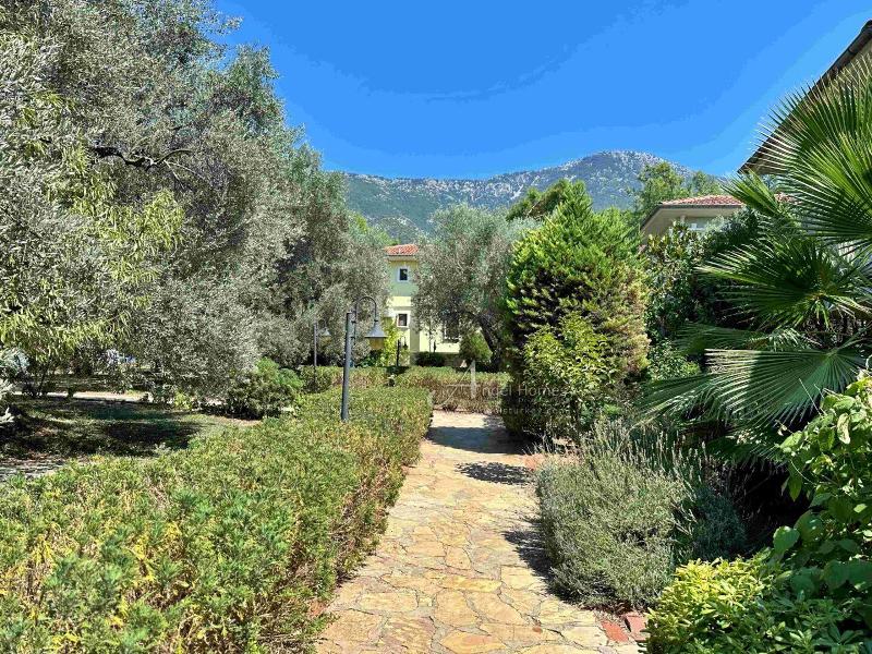 Bargain 2 Bedroom Furnished Property in Hisaronu Oludeniz Fethiye. Located in a gated complex with will landscaped green gardens and Large Shared Pool